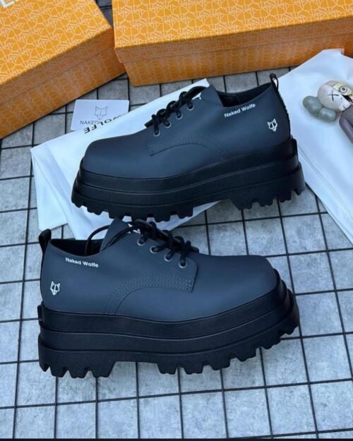 Explore Naked Wolfe shoes, designed for statement-making streetwear. Featuring chunky platforms, bold silhouettes, and luxury craftsmanship, Naked Wolfe defines the future of youth-driven fashion.