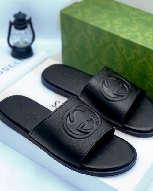 Gucci Black Leather GG Embossed Slide Sandals